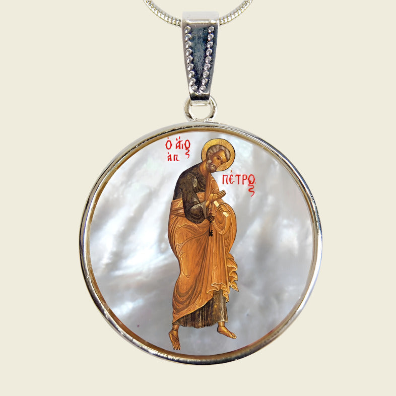 Silver-plated oval necklace with a mother-of-pearl cabochon pendant featuring an image of Saint Peter.