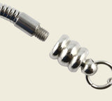 Screwing a pendant into a steel necklace