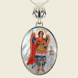A beautifully handcrafted Saint Michael the Archangel necklace, with a hand-painted icon on a Mother-of-Pearl cabochon and a silver-plated chain.