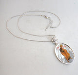 oval-shaped Saint Peter the Apostle necklace, featuring a hand-painted icon on a mother-of-pearl cabochon